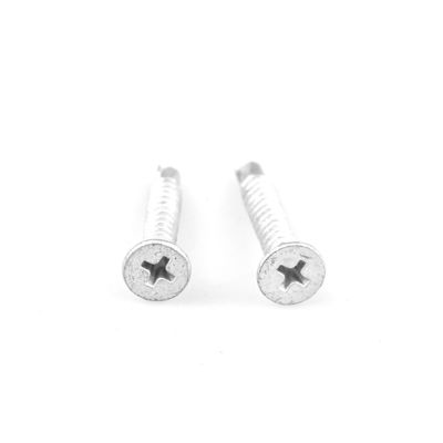 Tornos de auto-perforación de bi-materiales con acabado zincado